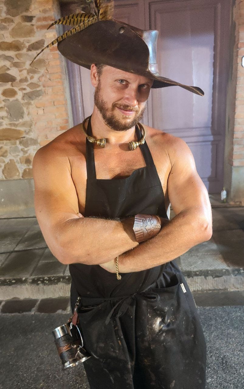 A weathered leather hat with added potion holders, designed for fantasy roleplay