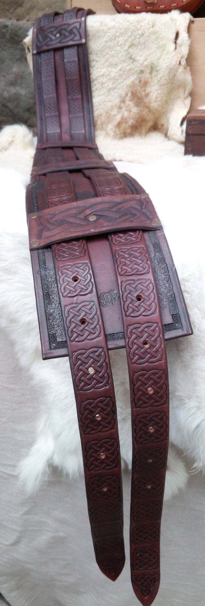 Double buckle belt with Celtic-inspired designs. Handcrafted from durable leather for LARP, Renfaires, or your next high quality costume