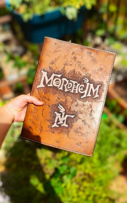 Customizable Mordheim leather rulebook cover, handcrafted for tabletop gaming enthusiasts
