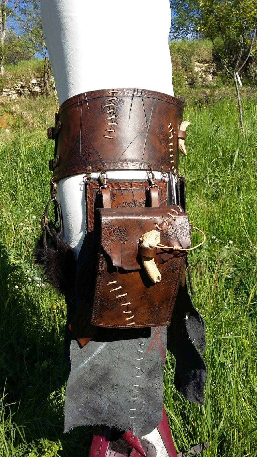 Tribal barbarian leather skirt with sheath and handbag, crafted from vegetable-tanned leather for LARP and cosplay.