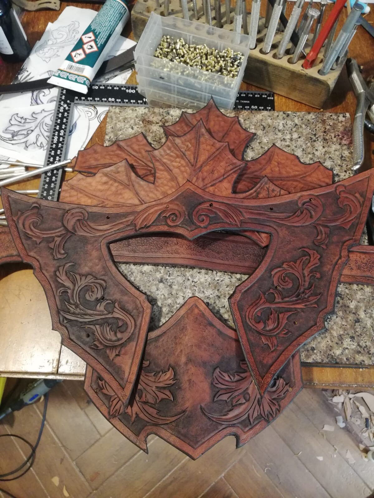 LARP-ready custom leather helmet with a detachable mask, showcasing intricate craftsmanship and high-quality Italian leather materials.