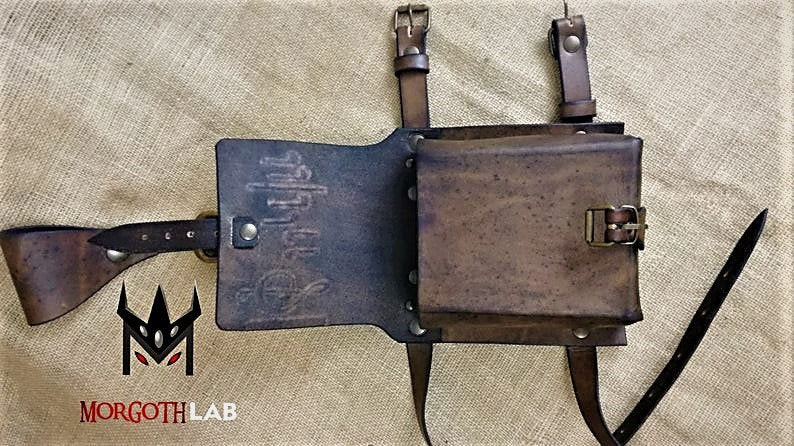 Custom engraved leather leg pouch, unisex design, available in black, brown, and personalized colors.