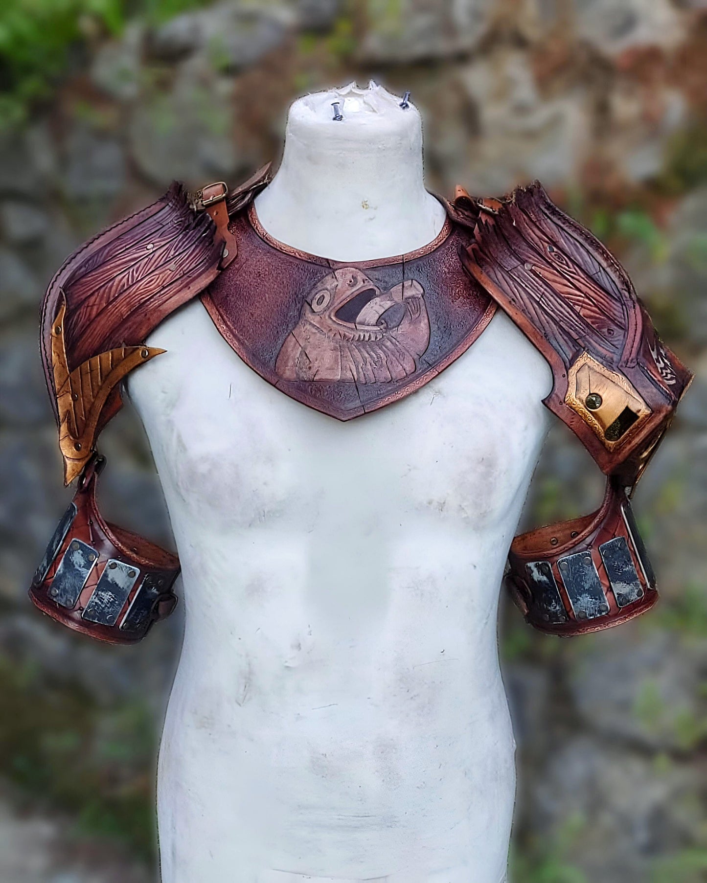 Engraved leather pauldrons inspired by a sailor’s ship – ideal for pirate and fantasy costumes, on mannequin