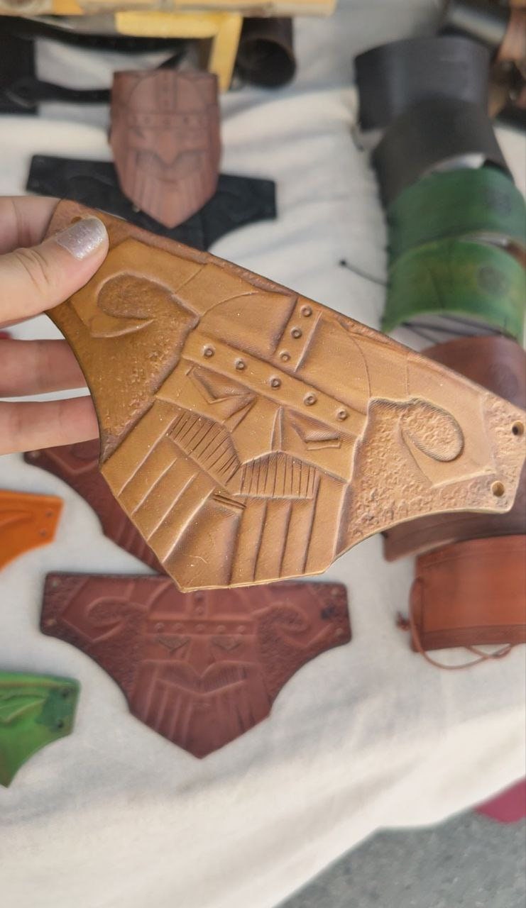 Hand-engraved Viking leather bracelet featuring Norse style and Nordic motifs, perfect for LARP, cosplay, and renfaires.