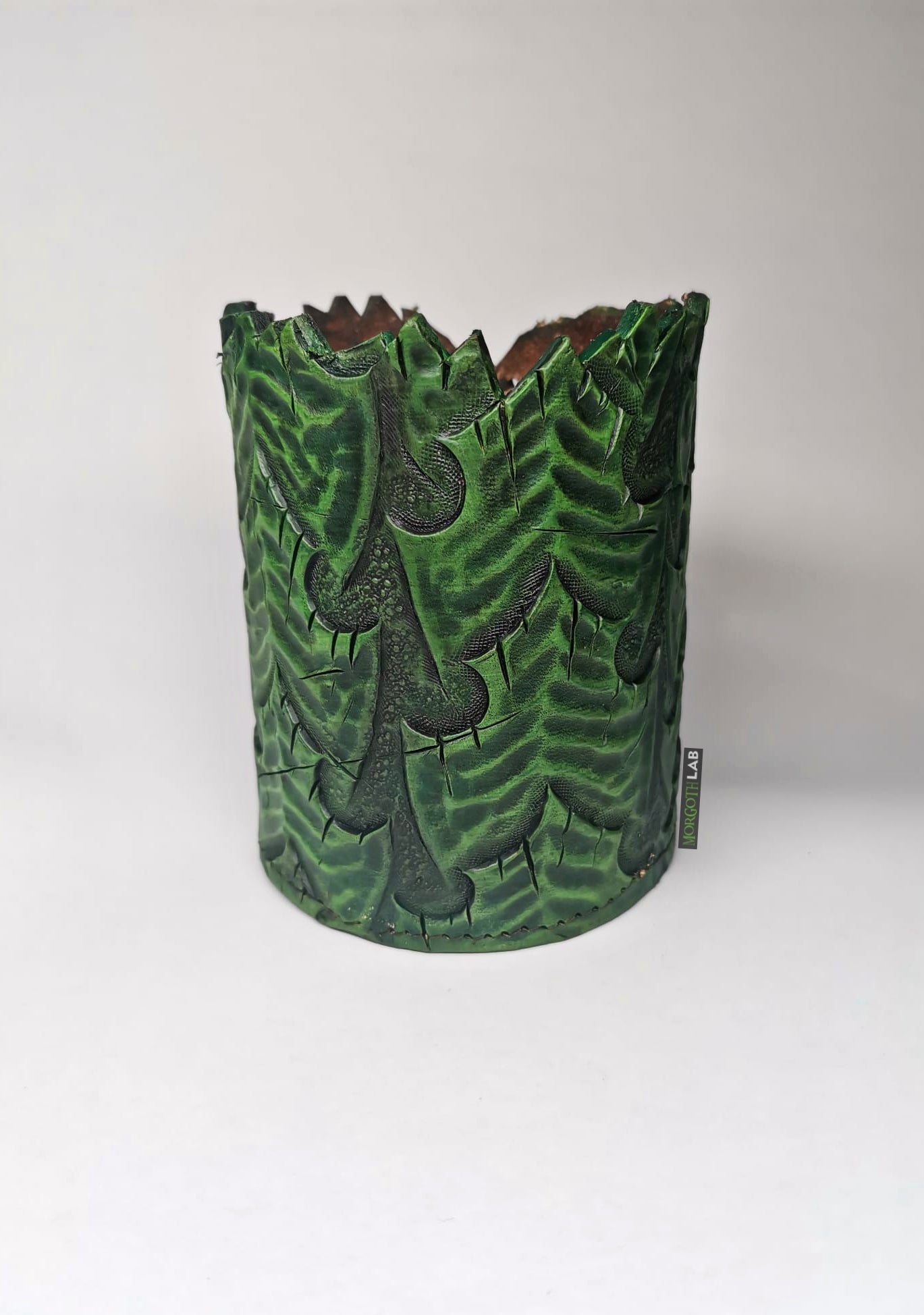 Artisan-crafted leather dice shaker, hand-molded and engraved by expert Italian artisans for RPG enthusiasts, green