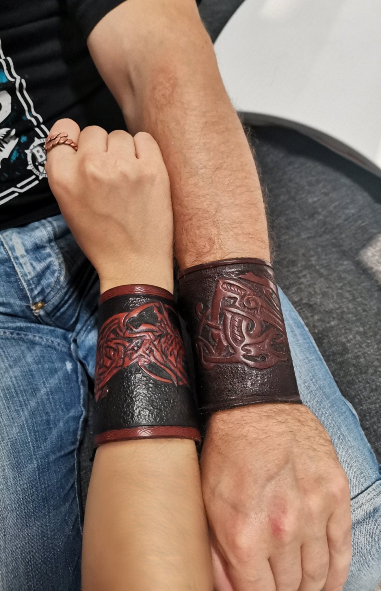 A fully customizable, handcrafted leather armlet with detailed engraving, made from genuine Italian leather.