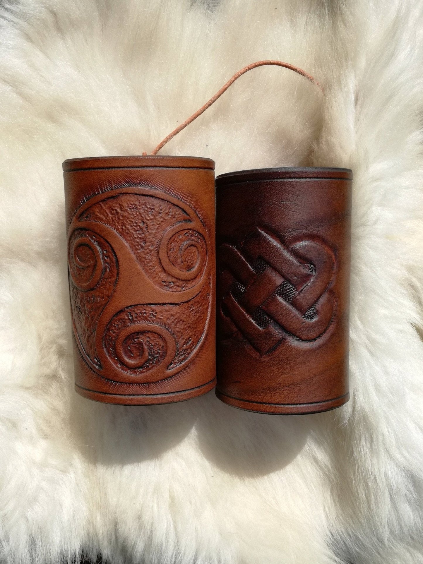 Handmade leather bracelet with intricate Celtic engravings, perfect for Viking, medieval, and fantasy lovers.