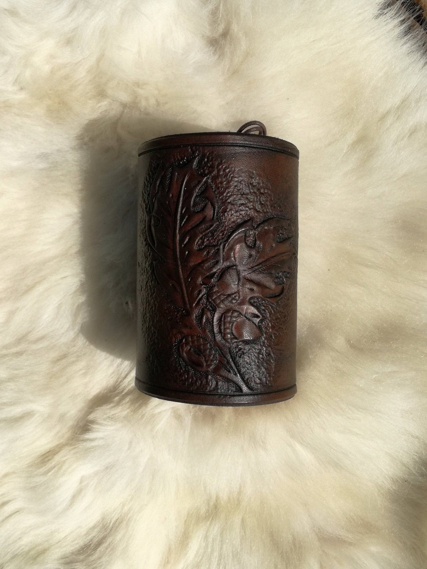 A unique handmade leather bracelet that makes a perfect personalized gift for men and women who love fantasy aesthetics