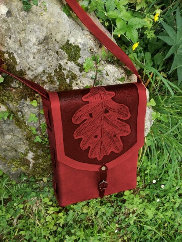 Handmade leather shoulder bag with customizable engravings, perfect for nature lovers, fantasy fashion, and cosplay enthusiasts shoulderbag