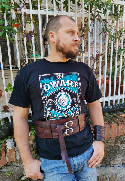 Double buckle belt with Celtic-inspired designs. Handcrafted from durable leather for LARP, Renfaires, or your next costume - worn on male model