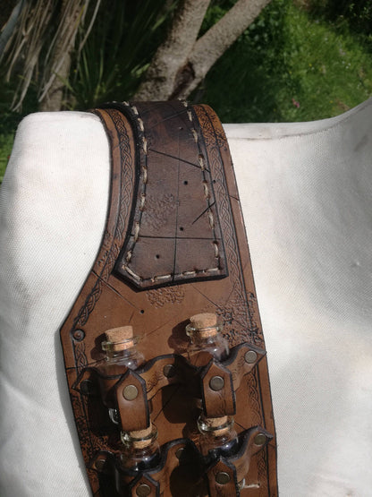 Handmade leather bandolier featuring flask holders—perfect for alchemists, potion makers, and fantasy characters, details