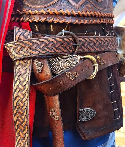  Handmade Italian leather belt with Celtic knot engravings, a unique and artistic medieval or fantasy-inspired piece.