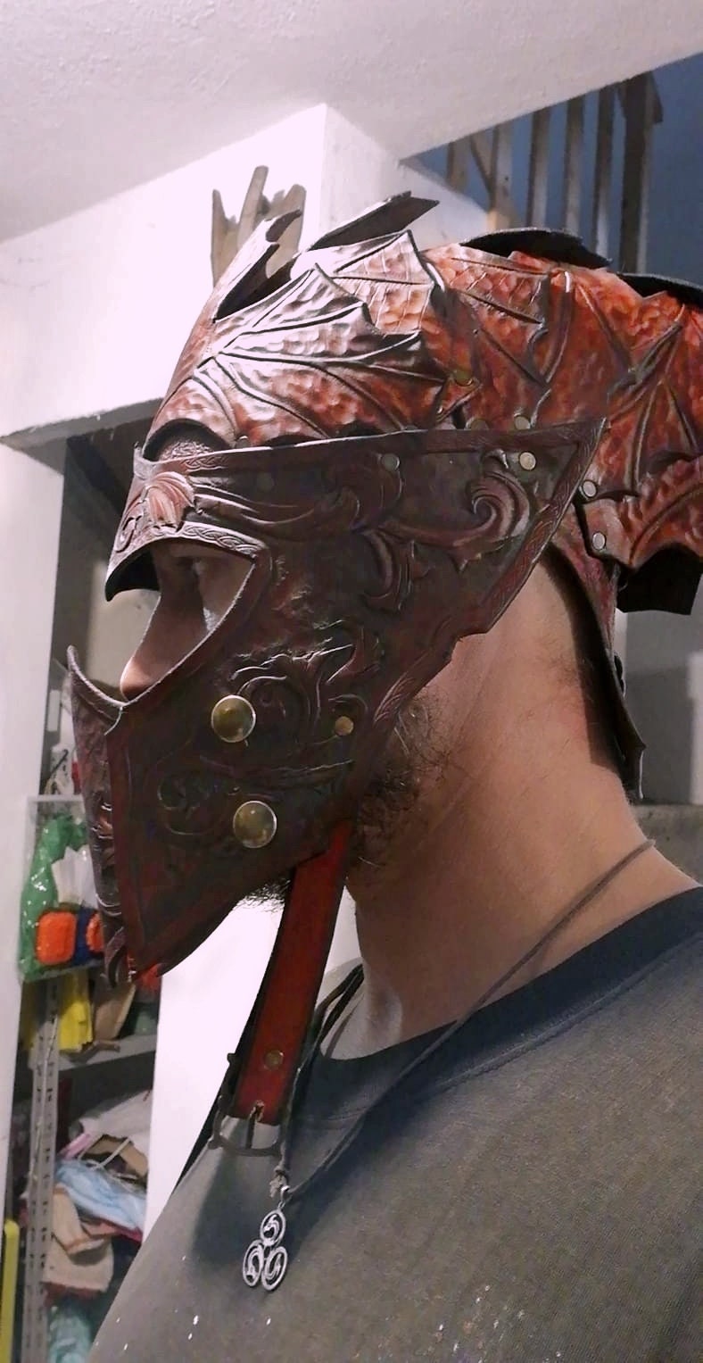 Fantasy-style LARP helmet with custom scales or leaf patterns. Handmade with high-quality vegetable-tanned leather
