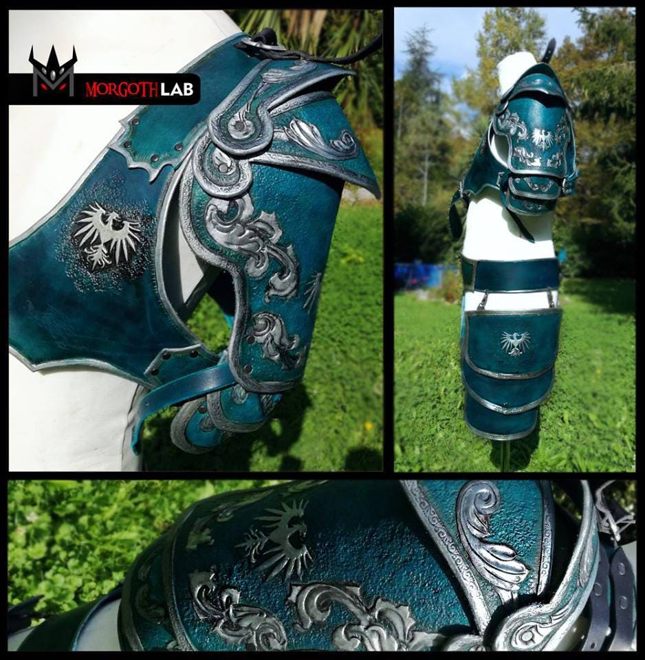 A green and silver leather spaulder, ideal for noble knights and high-ranking warriors. The engraved detailing adds an elegant touch, while the layered design ensures full mobility for combat and performance use