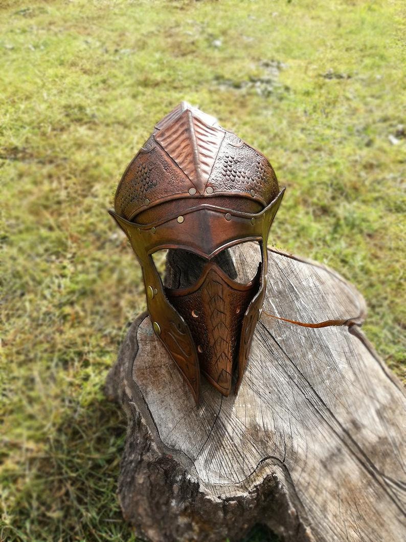 A handcrafted medieval leather helmet, ideal for historical armor sets and roleplay enthusiasts