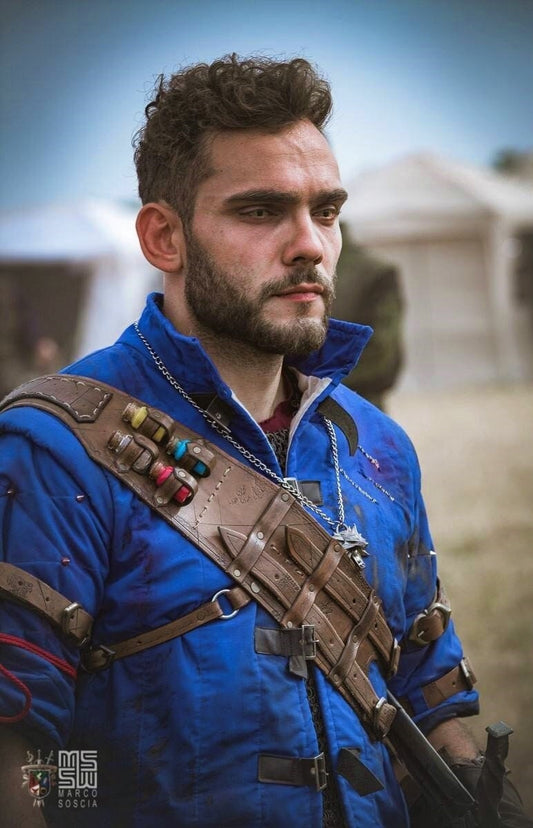 A handcrafted leather bandolier, perfect for LARP, cosplay, and fantasy costumes. Made from high-quality Italian leather