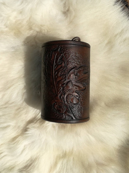 A unique handmade leather bracelet that makes a perfect personalized gift for men and women who love fantasy aesthetics