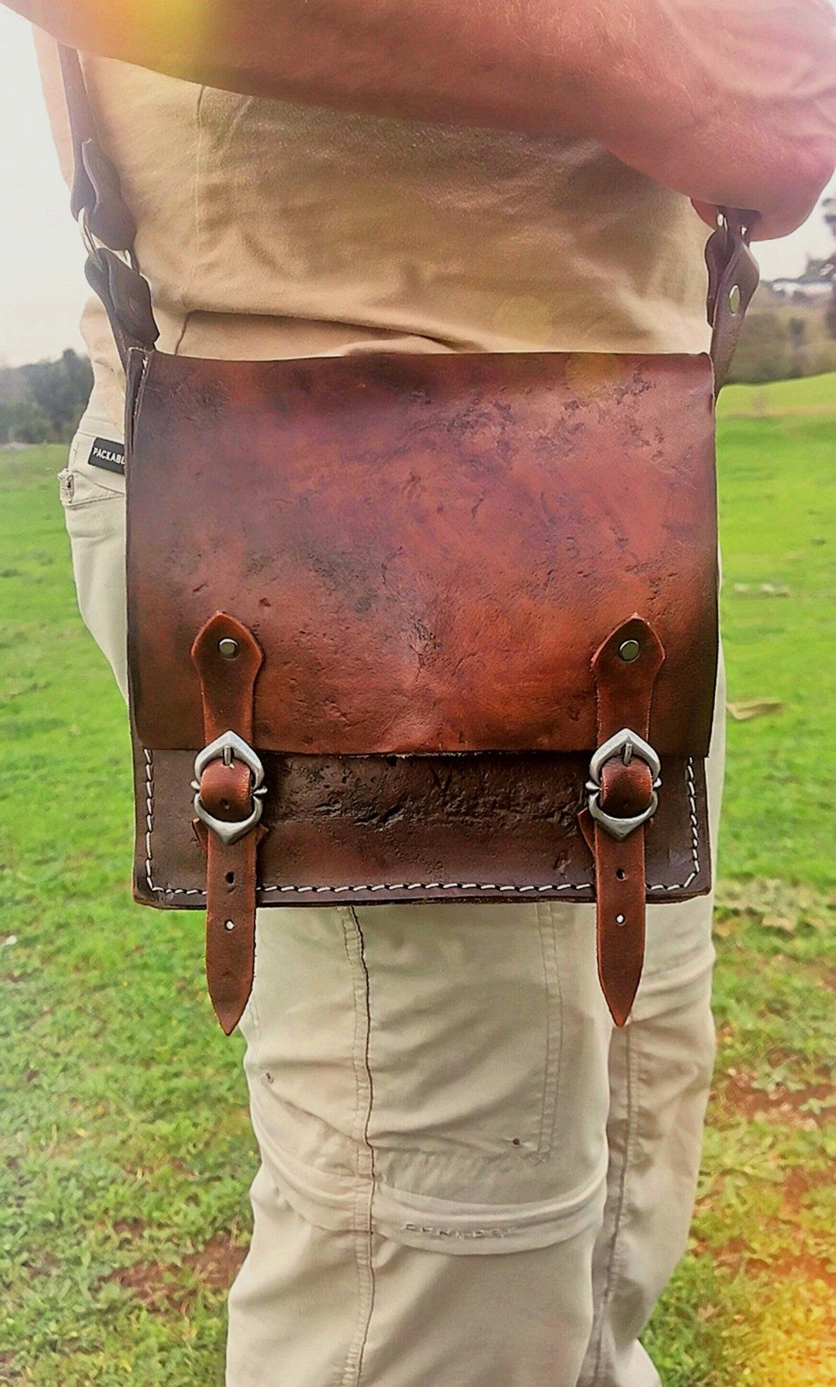Handmade leather shoulder bag inspired by Geralt’s Ursine Armor from The Witcher, made from genuine Italian leather with adjustable strap and engraved details