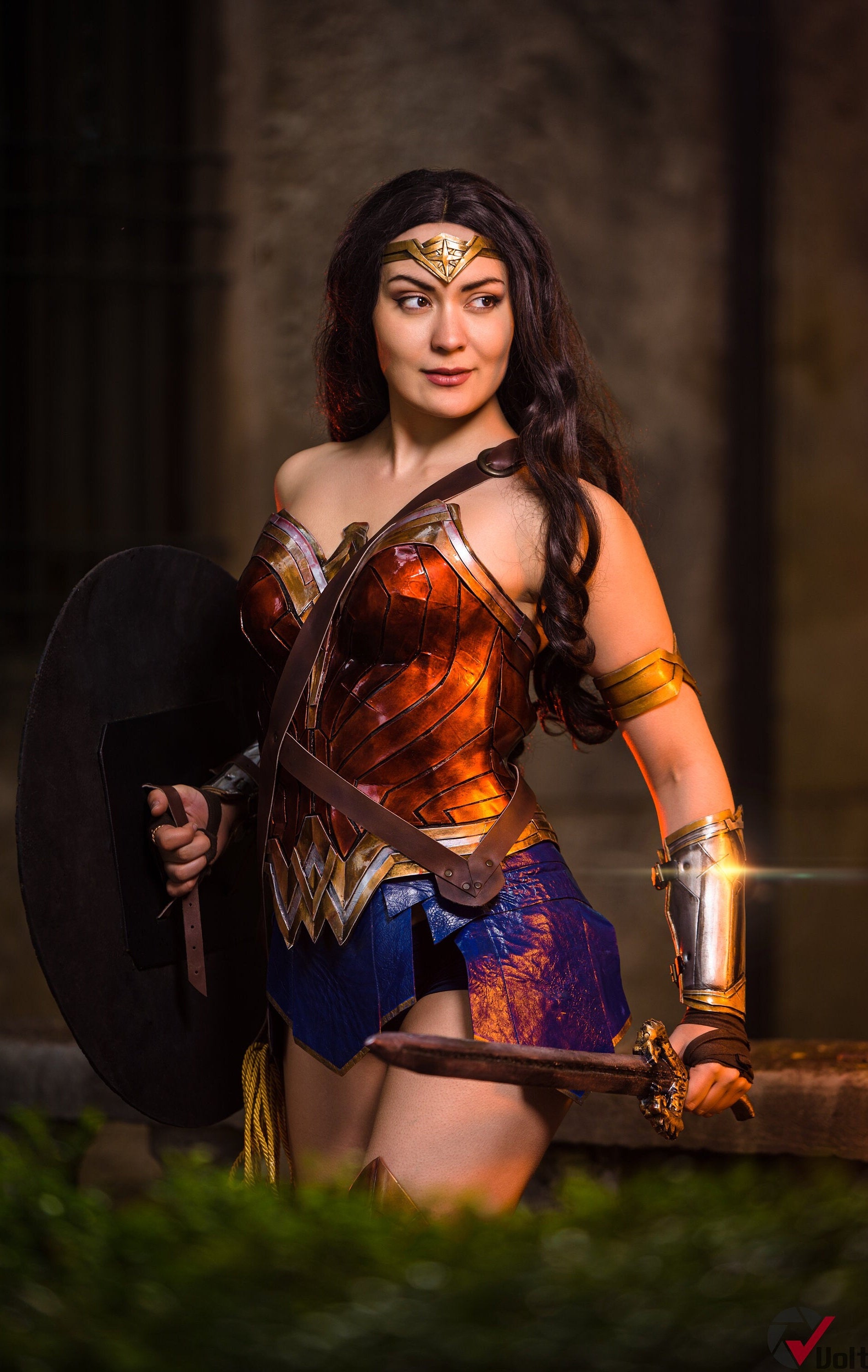 Hand-painted Wonder Woman corset with customizable matte or glossy finish, perfect for cosplay events.