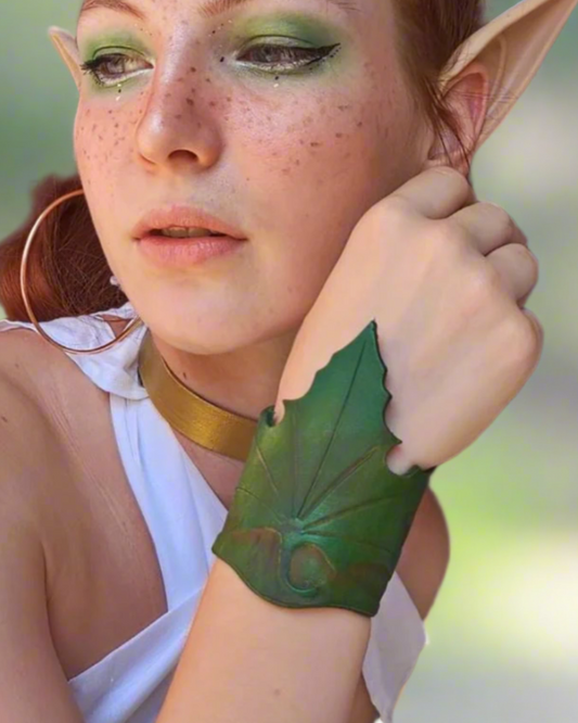 Handmade leather leaf bracelet with intricate engraving, inspired by elven and boho styles