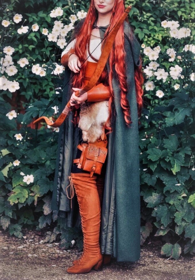 Leather leg pouch with custom Celtic, steampunk, or medieval engraving, handmade in Italy. Worn by an elf model