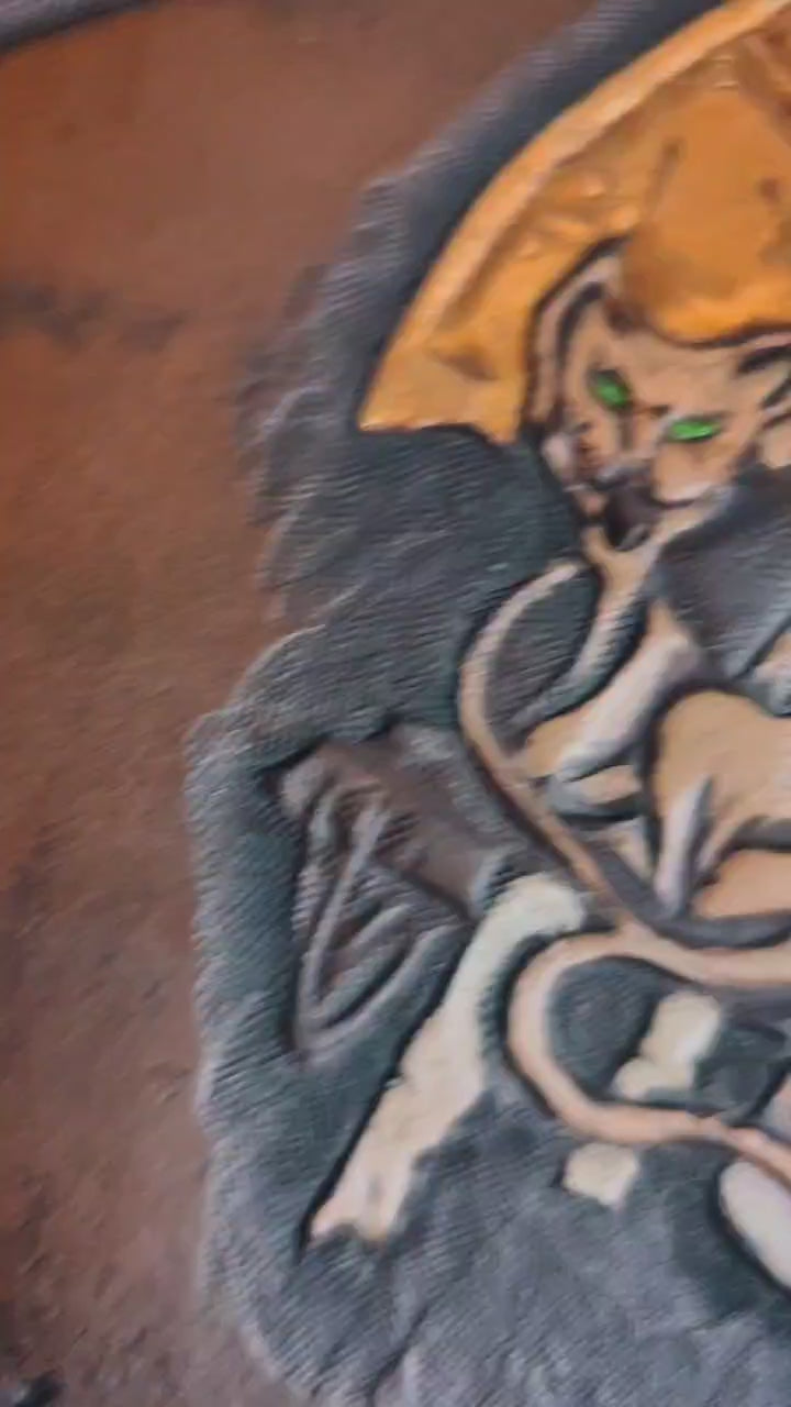 Handmade leather book cover with customizable engravings, perfect for rulebooks, handbooks, and tabletop games