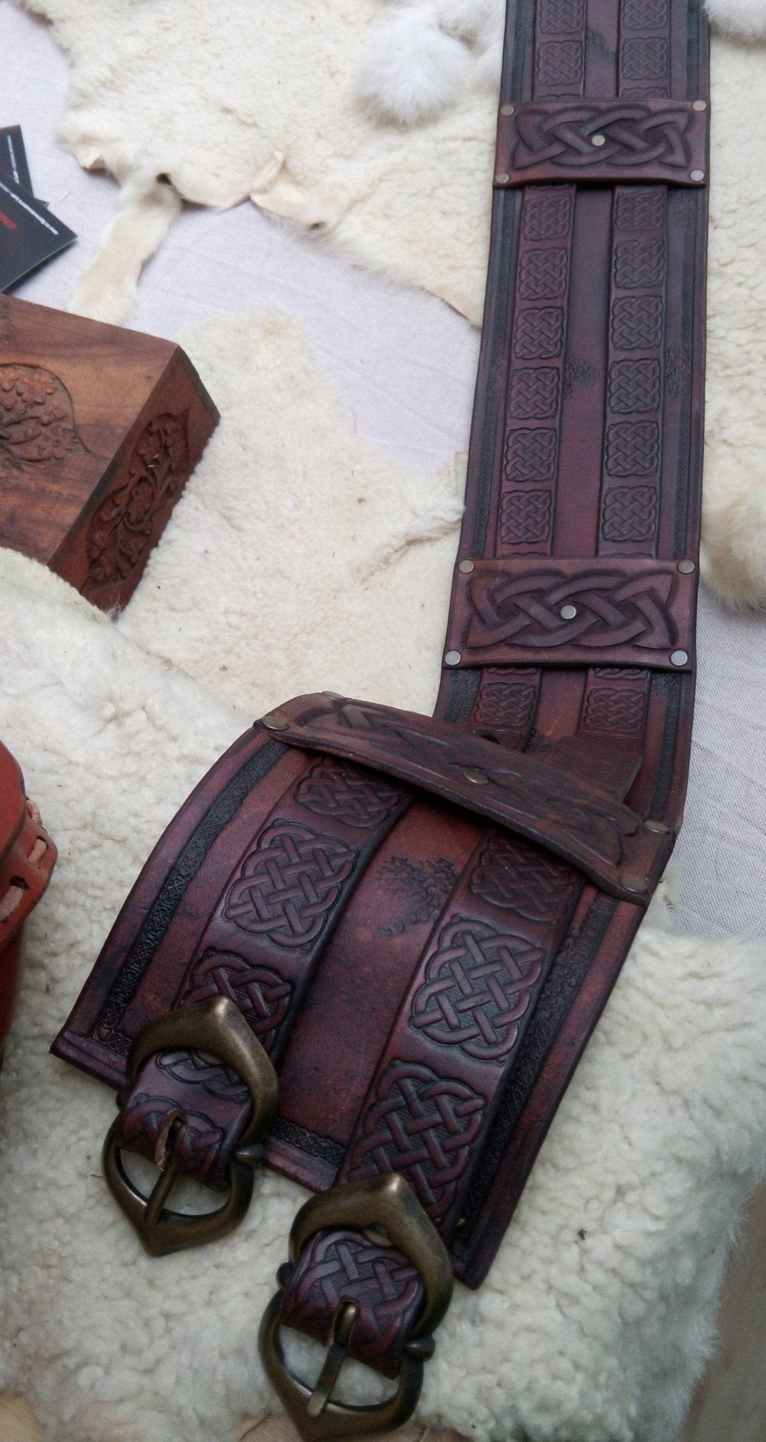 LARP and Renfaire enthusiasts will love this handmade leather belt. Adjustable double buckle and Celtic designs for a perfect fit