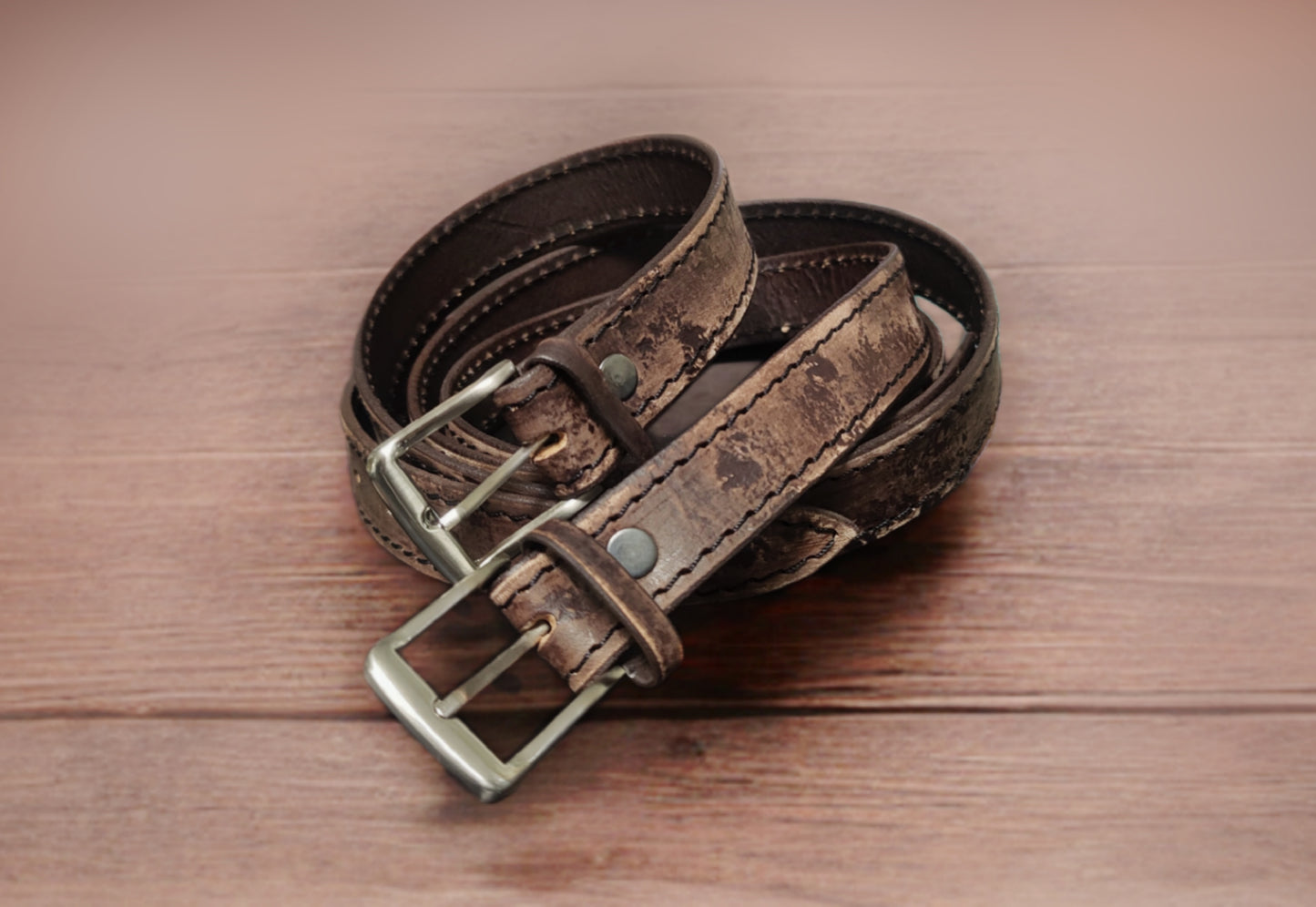 Vintage-style handmade leather belt with a weathered finish, crafted from high-quality Italian leather for a timeless aesthetic.